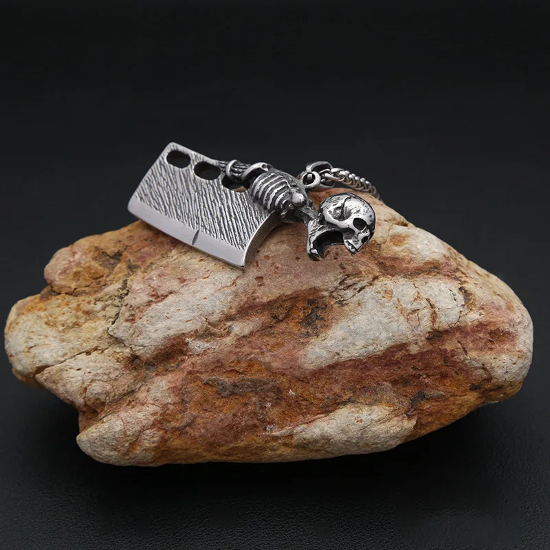 

Polished non-tarnish stainless steel pendant trend personalized titanium steel skull knife pendant
