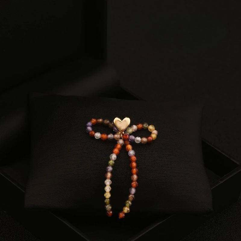 

Korean Iridescent Crystal Bow Collar Pin Anti-Exposure Magic Tool Suit Jacket Matching Accessories Fixed Clothing Pin Gifts 6704