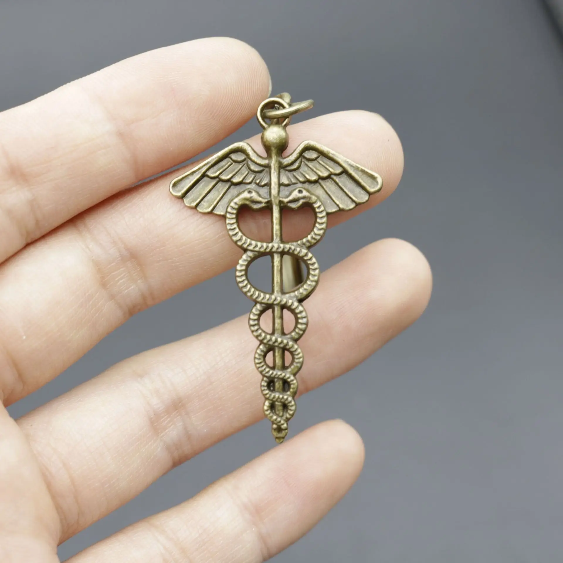 2024 Hot selling Jewelry Simple Double Snake Cane Medical Symbol Car Keychain Pendant