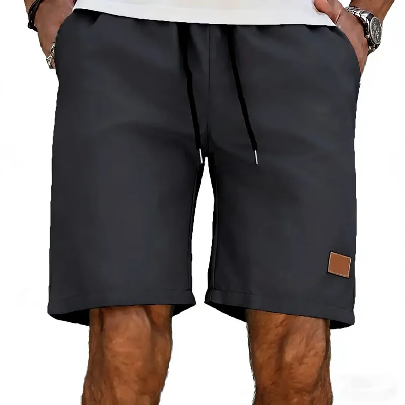 

Summer new fashionable solid color men's shorts, men's leather label casual shorts, men's sports casual shorts