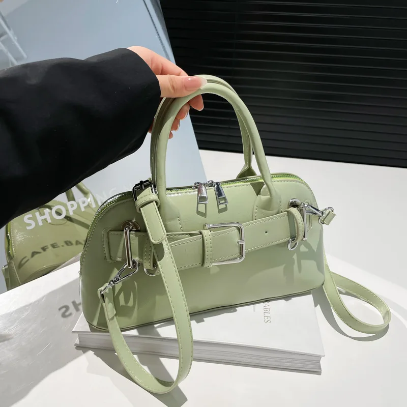 

Лето 2025 года, нишевая сумка-ракушка с пряжкой на ремне, дизайнерский женский кошелек с верхней ручкой, универсальная сумка через плечо, минималистичная сумка через плечо