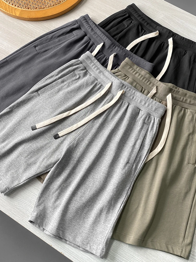 

Высококачественные мужские повседневные хлопковые шорты с эластичным поясом, длина до колена, летние, для отдыха, модные, свободного кроя, для молодежи