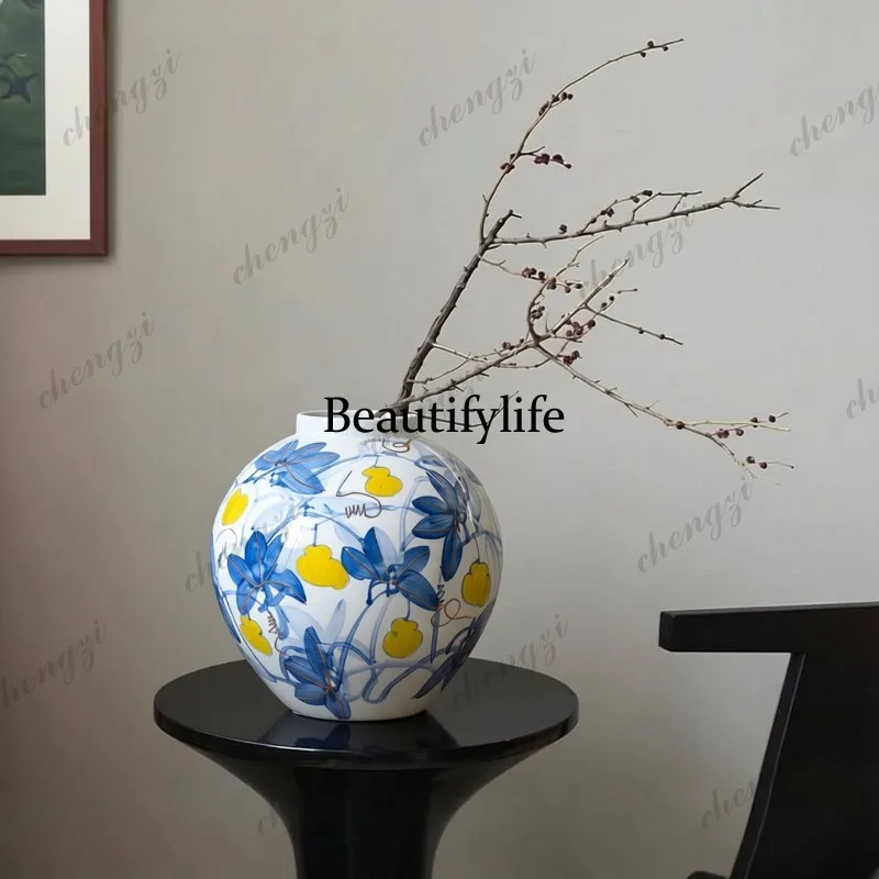 Purely hand-painted blue-and-white with gold accents, Oriental aesthetic round-bellied ceramic flower vessel, light luxury