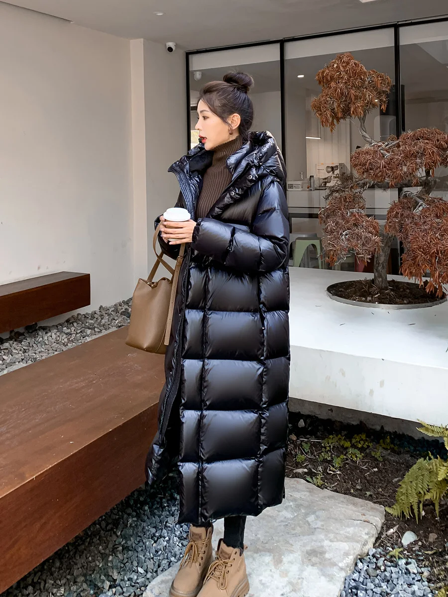 Schwarze Frauen Daunen mantel Winter verdickt warme Kapuze Reiß verschluss lange Puffer Parka weibliche 90% Daunen mantel S-XXXL