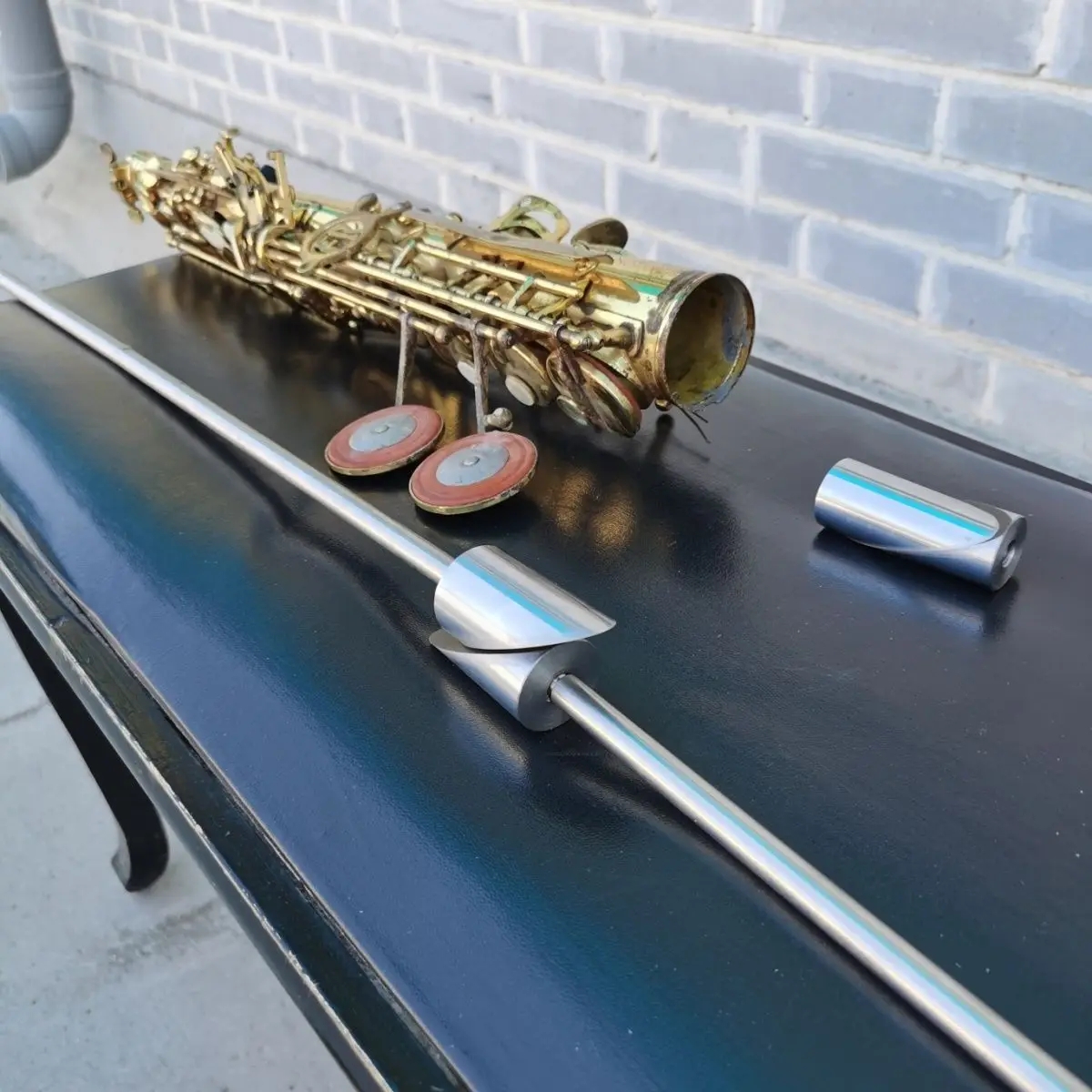 Copper woodwind instrument repair tool, saxophone sheet metal tool, supervisor, concave top circular artifact