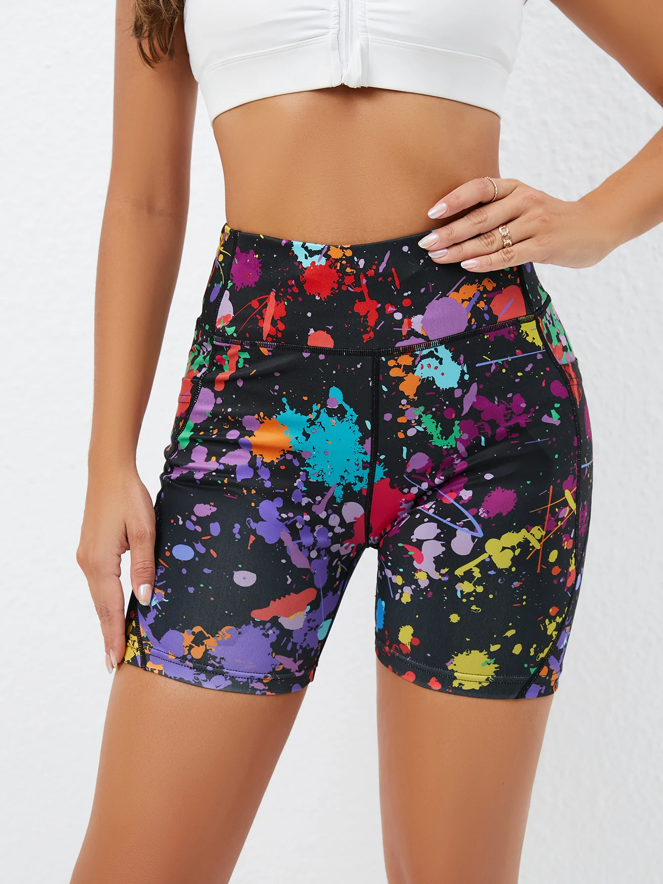 A tropical splash print high-waisted yoga shorts with pockets, polyester knitted fabric, elasticity, regular silhouette, suitabl
