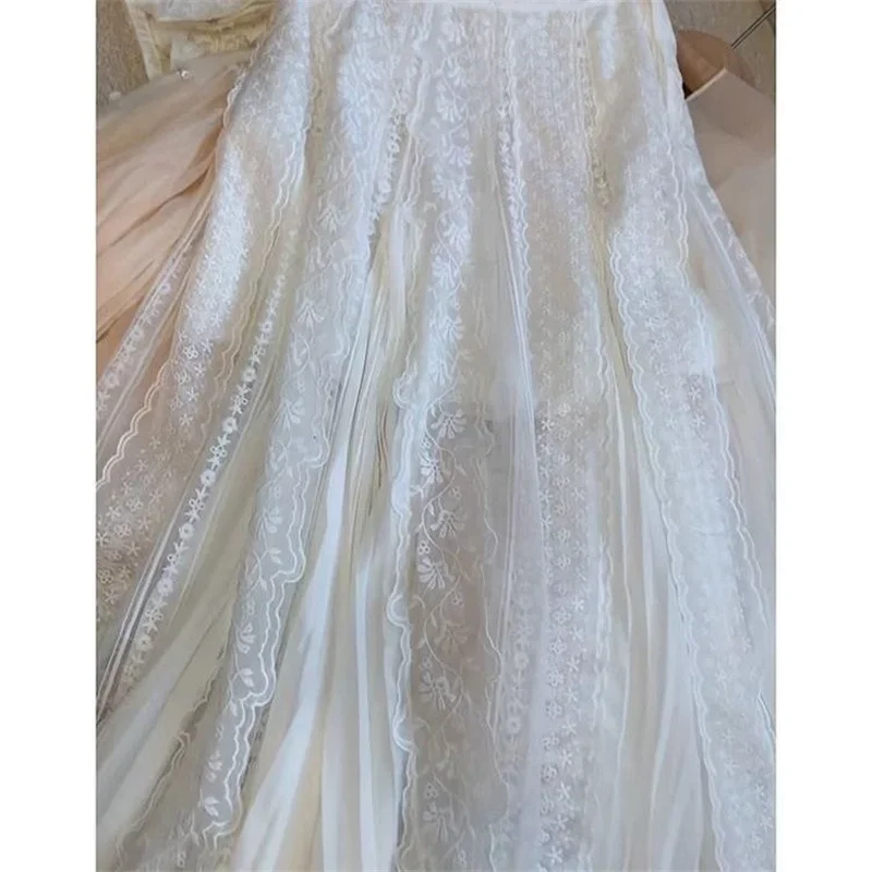 Nouvelle mode fleur broderie dentelle Jupe femmes français élégant Tutu Tulle jupes maille a-ligne longue Jupe printemps vêtements