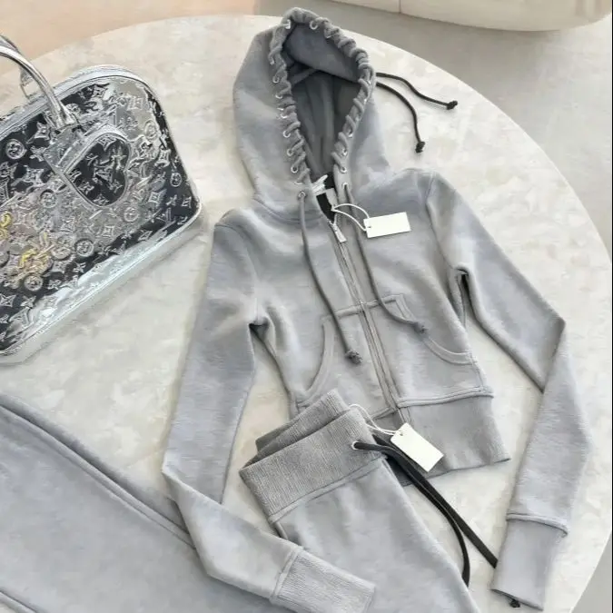 Nell'autunno e nell'inverno del 2025, giacca da donna sexy e piccante slim fit traforata con coulisse e cerniera corta ombelico esposto Y2K