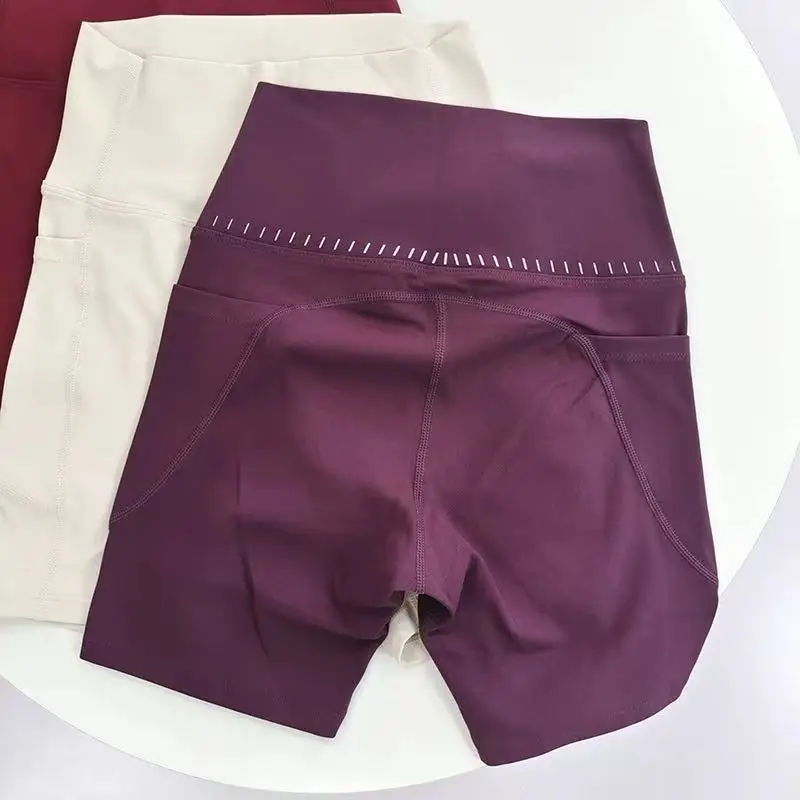 Shorts de ioga femininos de cintura alta com bolsos laterais, comprimento quater para levantamento de quadril, para ciclismo, fitness, corrida e esportes