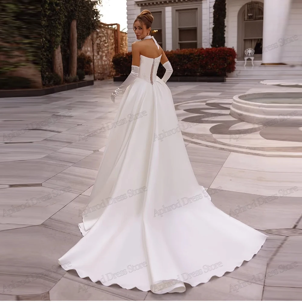 ชุดแต่งงานที่งดงาม ชุดเจ้าสาวที่มีเสน่ห์ ประดับด้วยลูกปัด แอพพลิเคชั่น คอเรือ เสื้อคลุมแขนกุด วินเทจ เวสติโด เด โนเวีย แบบสั่งตัด