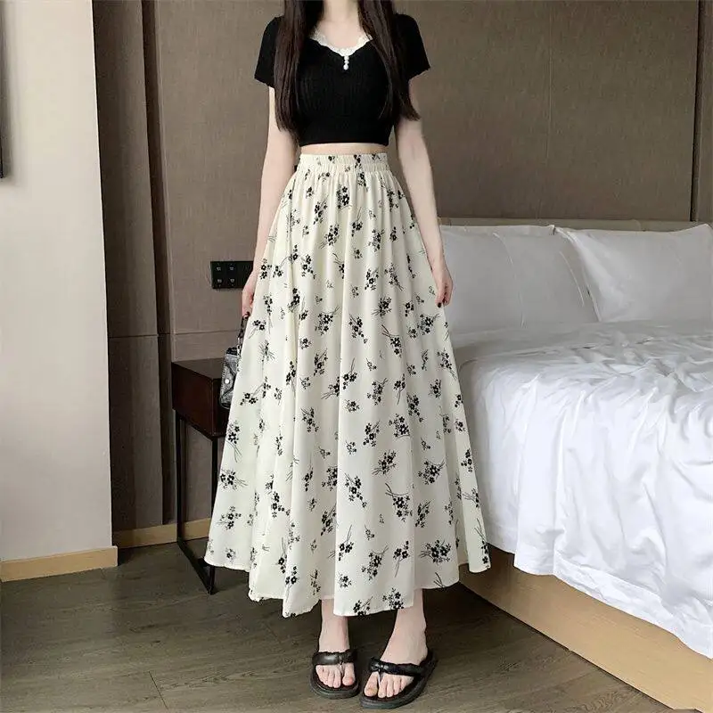 

Летняя тонкая юбка макси с высокой талией, утягивающая, черно-белая, с цветочным принтом, женская, в корейском стиле, новая, элегантная, А-силуэт, миди-юбка