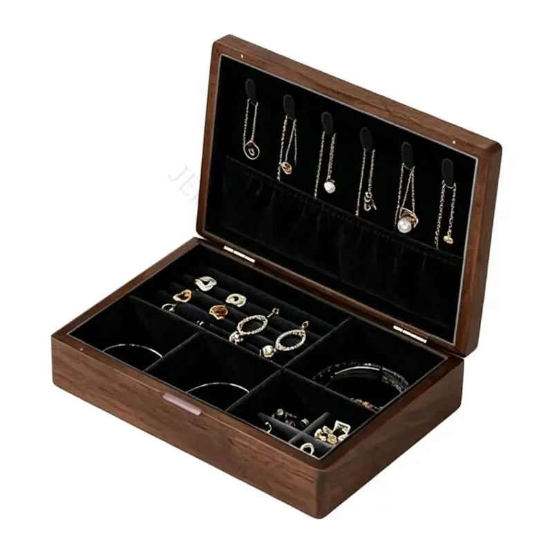 R7UF Jewelry Display Box with Hinged Star-Pattern Lid, Separate Lower Compartments, Ring Rolls, and Necklace Storage Area