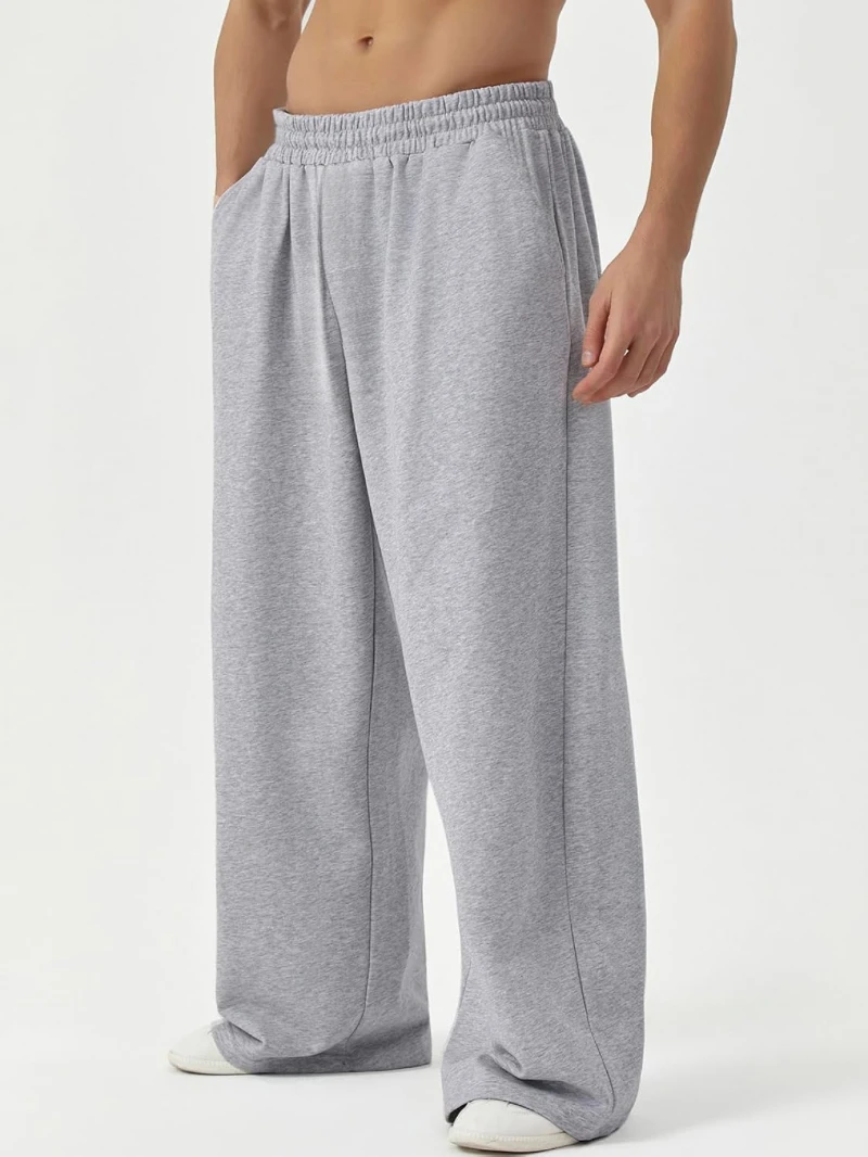 Men's loose-fit, wide-leg sweatpants with an elastic waistband—casual joggers  men pants