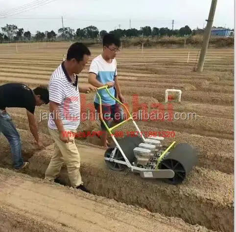 2018 new JD4 lines hand push seeder for canola muskmelon seed planting