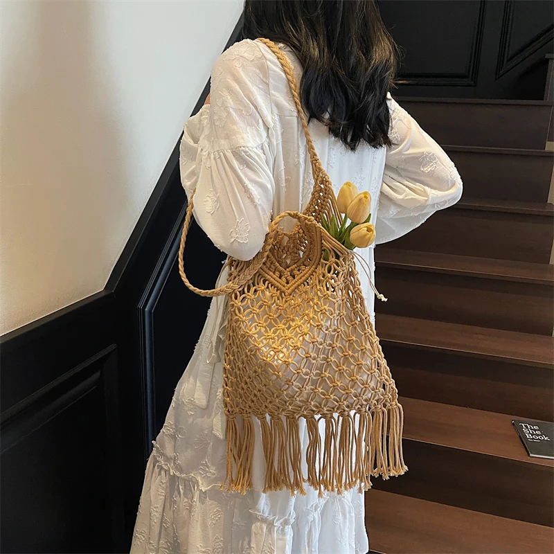 

Women Tassels Crochet Tote Bag Hollow Beach Bag Large Capacity Knitted Bag Solid Color Simple Shopping Bag for Travel Vacation