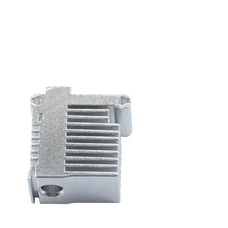 

Silver heat sink at the hot end of the Kobra 3 extruder For the 3D printer