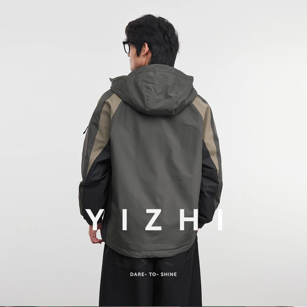 Giacca in cotone con cappuccio da uomo alla moda 2025 Autunno Inverno Nuova giacca in cotone caldo per esterni Giacca con cappuccio a blocchi di colore