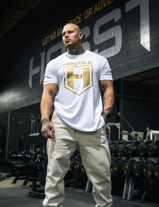 2026 new Gold Shield Emblem Fitness Graphic Print High‑Quality Comfort Loose Gym Short‑Sleeve Tee