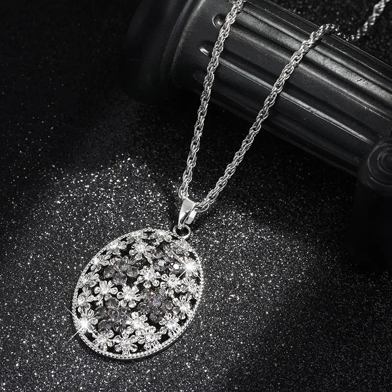 新しい多機能セーターチェーンネックレス、女性に適したロングでファッショナブルなクリスタルペンダント