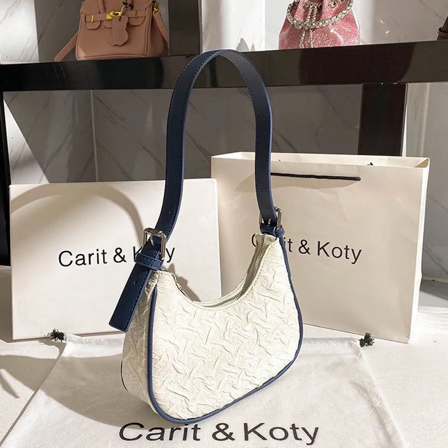 

Original design advanced sense this year's popular pleated bag female summer niche design crescent bag underarm bag shoulder