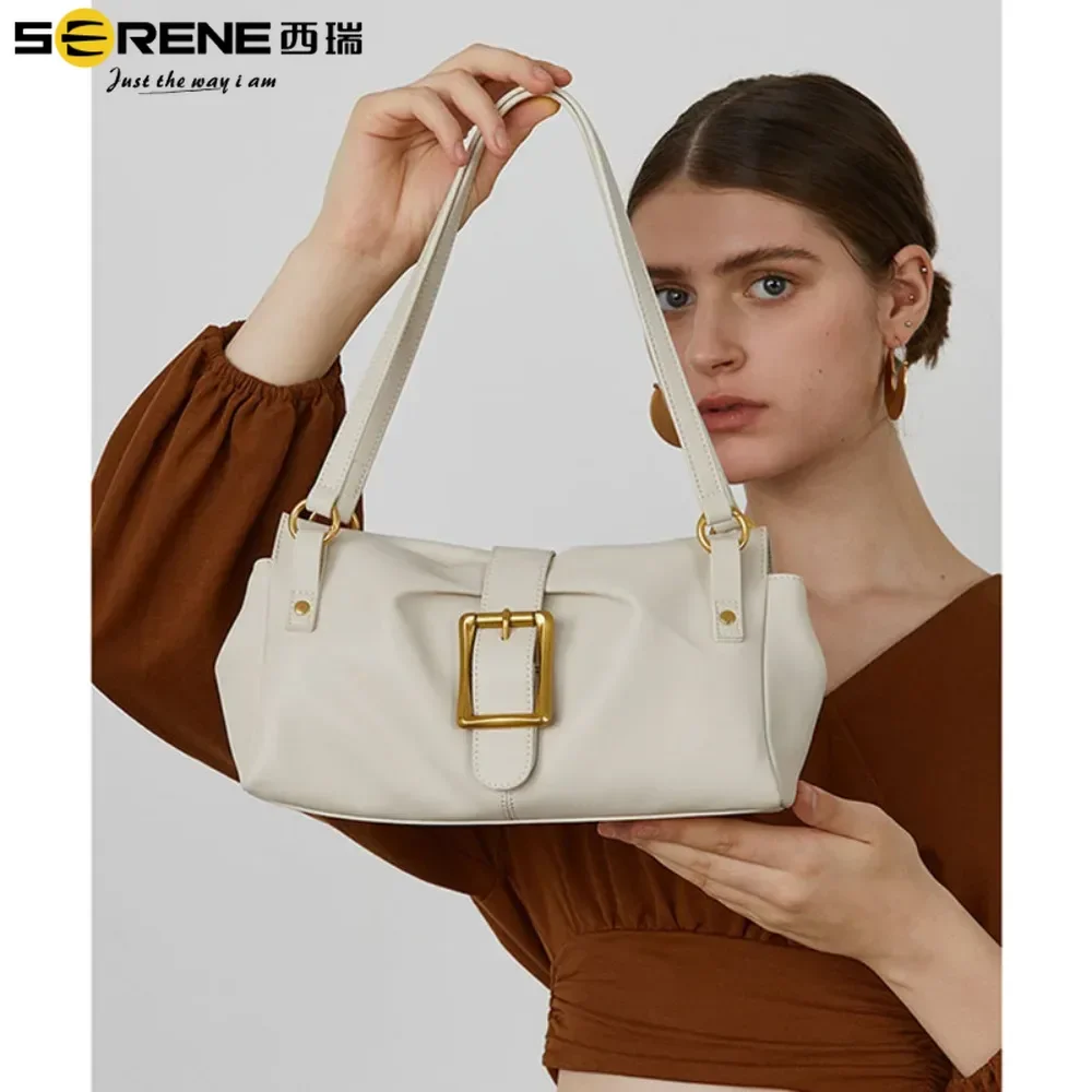 Women's bag 2024 new niche hand-held armpit cowhide high-end feeling French stick bag genuine leather shoulder bag