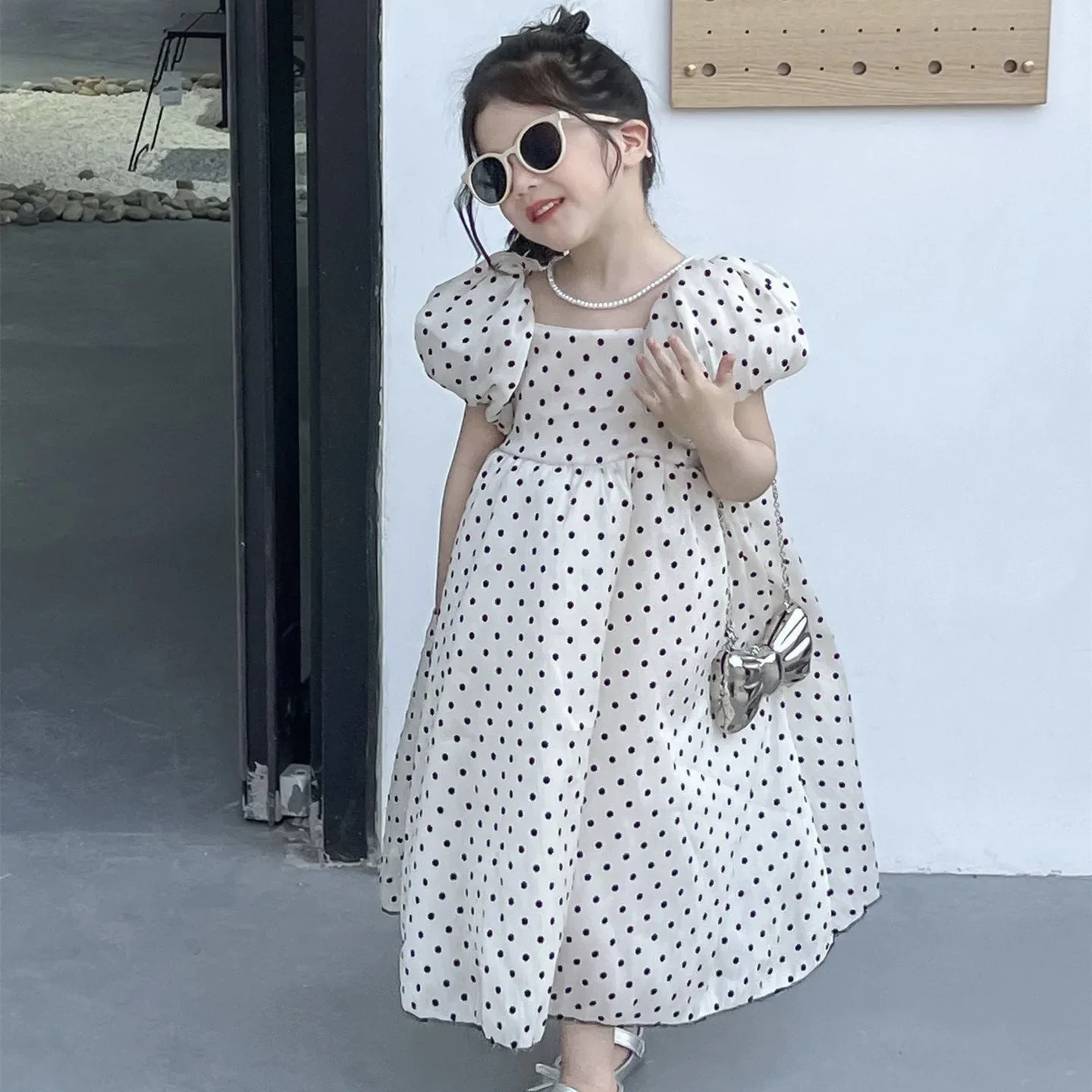 

2025 Summer Korean Children's Clothing Girls' Vacation Style Fungus Edge Flocking Polka Dot Bubble Sleeve Dress Princess Dress