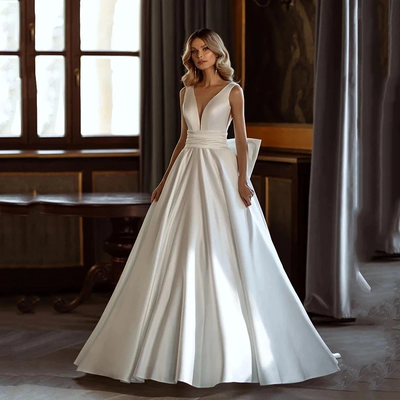 Abiti da sposa di moda moderna abiti da sposa in raso lucido fiocco decorare abito semplice con scollo a v Backless senza maniche Vestidos De Novia