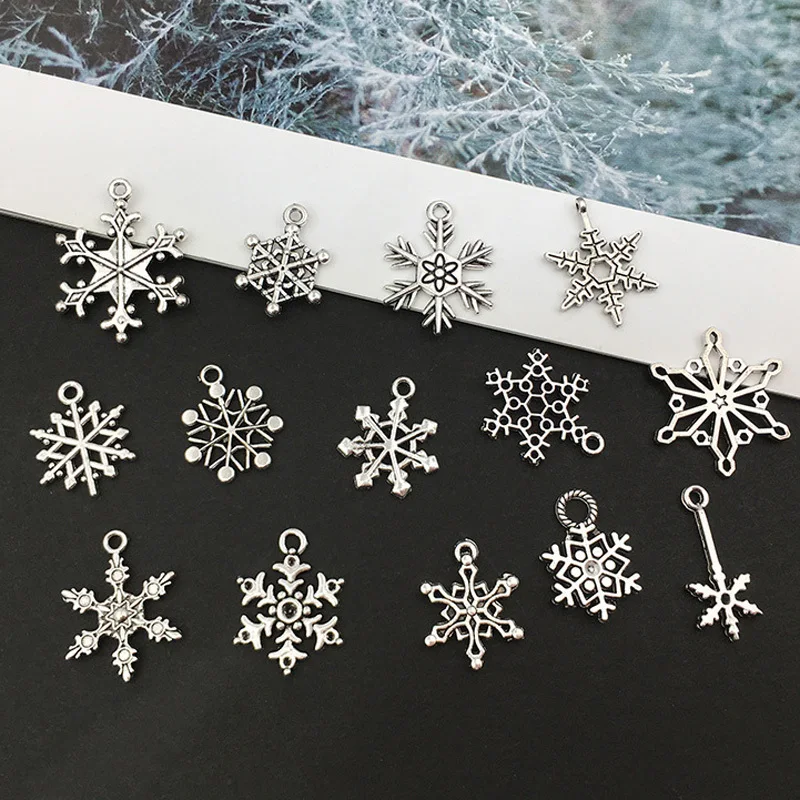 (14Pcs/pack)1cm-2.5cm Mixed Silver Alloy Snowflake Pendant Christmas Decoration Metal Hollowed Out Snowflake Handmade Gift Label