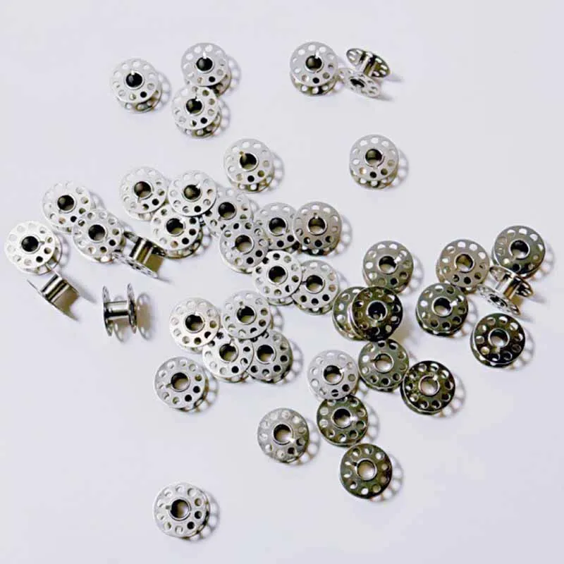 10-60 قطعة ماكينة خياطة منزلية لفائف الأسطوانة بكرات معدنية بكرة فارغة الفولاذ المقاوم للصدأ لأجزاء خياطة لف خيط الحرير