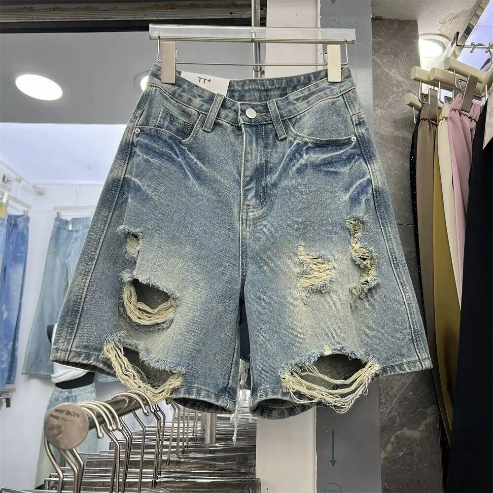 Pantaloncini di jeans strappati a vita alta a gamba dritta lavati retrò per le donne 2024 estate nuovi pantaloncini a gamba larga in cinque parti blu