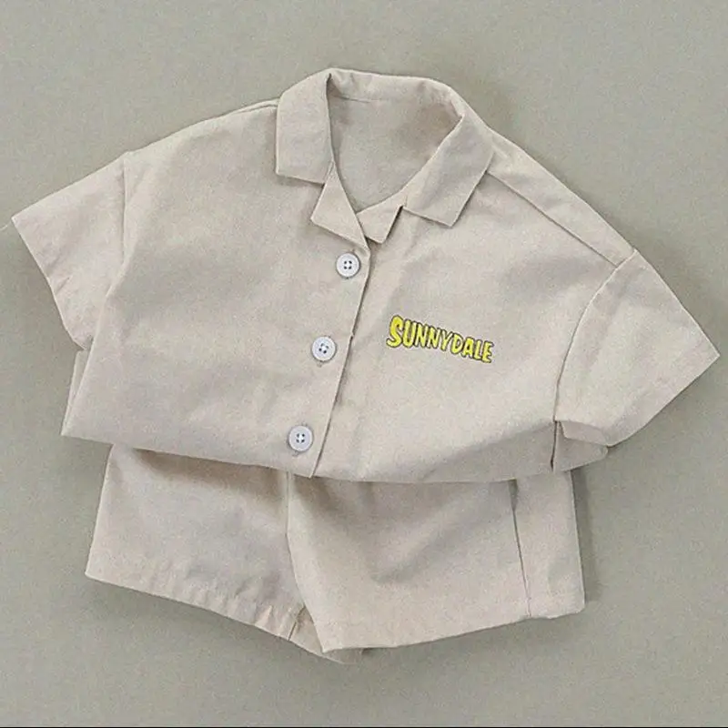 

2026 Summer New Children Short Sleeve Clothes Set Boys Girls Lapel Letter Shirts + Shorts 2pcs Suit Simple Casual Kids Outfits