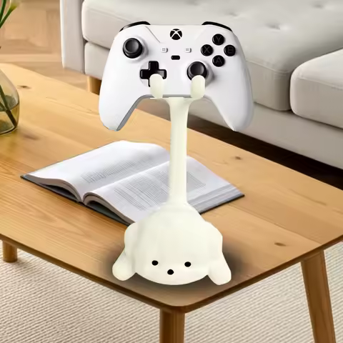 A cute cat-shaped game stand, compatible with PS5/PS4/Xbox/Switch, made of plastic and not easy to break