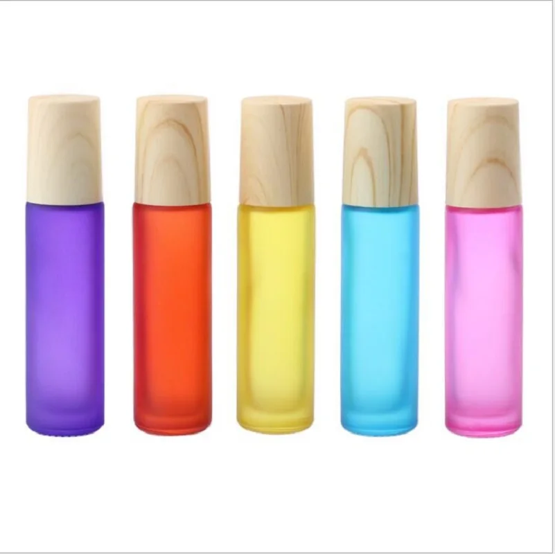 Garrafa de vidro colorida fosca de 10ml, bola de rolo de aço em forma de madeira, creme/perfume/óleo essencial, desodorante, embalagem de cuidados com a pele
