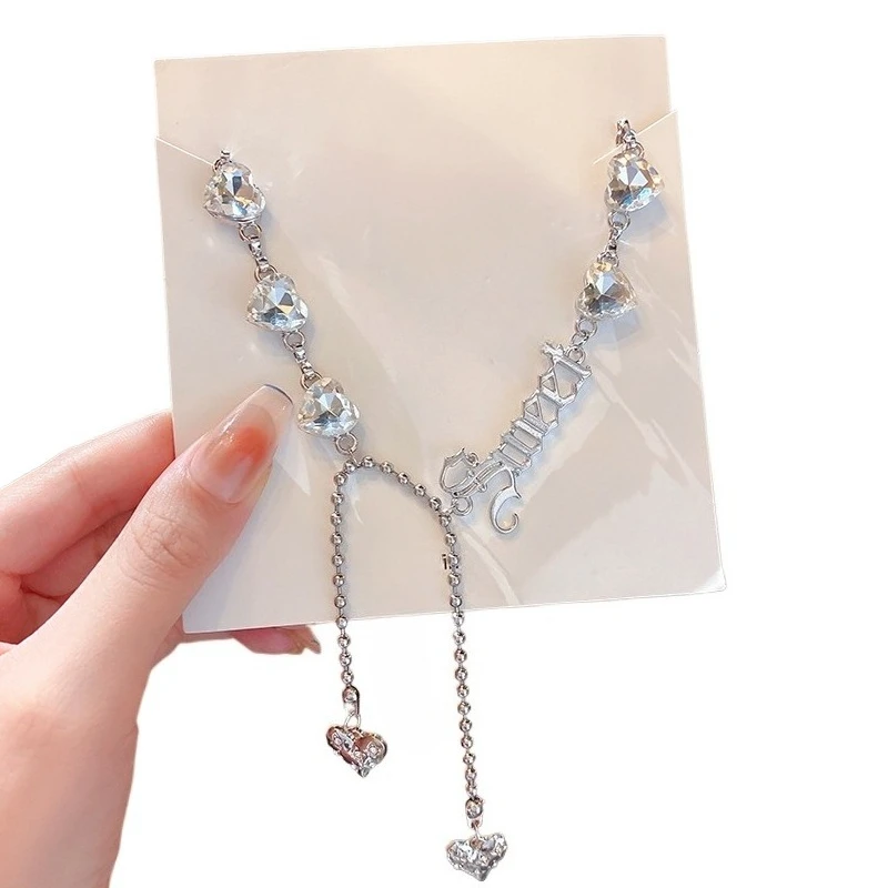 

Sweet and cool star fringed necklace light luxury niche neck chain design sense premium sweater chain