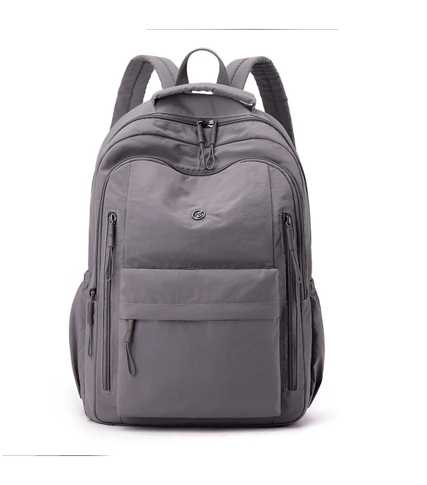 Light gray lightweight travel backpack multi zippered pockets front slip pocket soft smooth fabric adjustable drawstring pulls