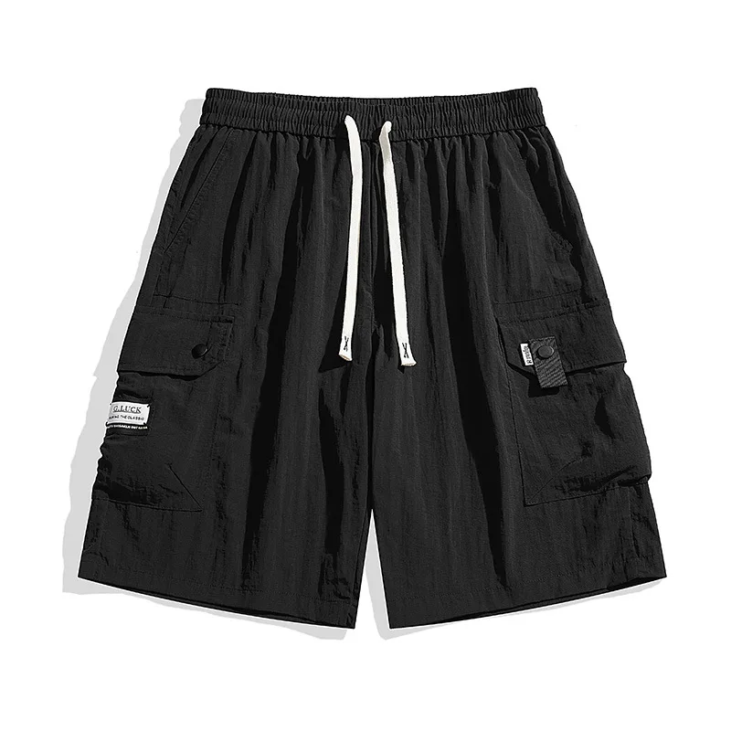 صيف جديد الرجال العلامة التجارية العصرية ملابس العمل السراويل الكورية فضفاضة كبيرة الحجم سراويل تقليدية تنفس التجفيف السريع أزياء الشارع