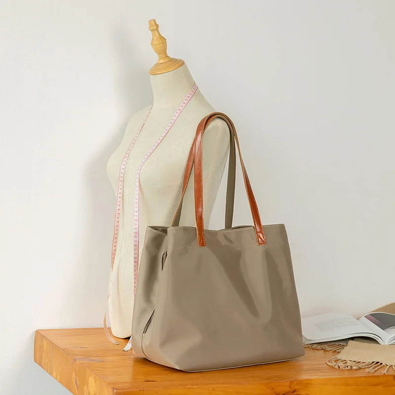2026 Oxford Fabric Tote Bag Pu Leather Wide Shoulder Strap Two Size Option Solid Neutral Tone Office Shopping Women Purse