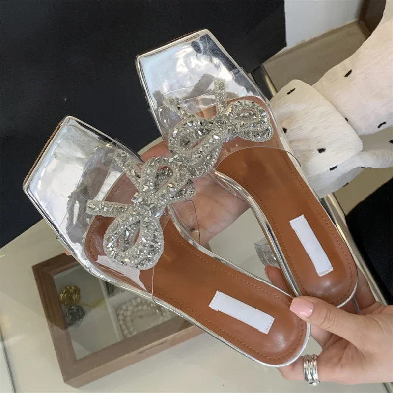 Eilyken Elegant Bowknot PVC Transparent Women Slippers Fashion Square Toe Sandals Summer Crystal High Heels Ladies Shoes