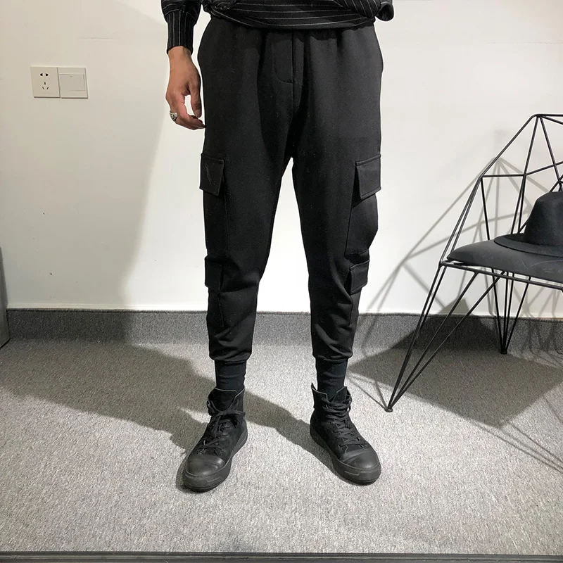 

Осенние мужские свободные комбинезоны в темном стиле с несколькими карманами и завязками на щиколотке, европейские и американские уличные эластичные спортивные штаны, модные