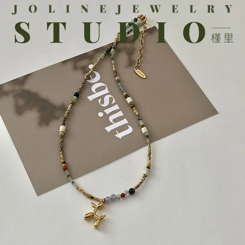

Miguang Balloon Dog Necklace Color Beaded Handmade Niche Art Cold Stacked Collarbone Chain Female Direct Sales
