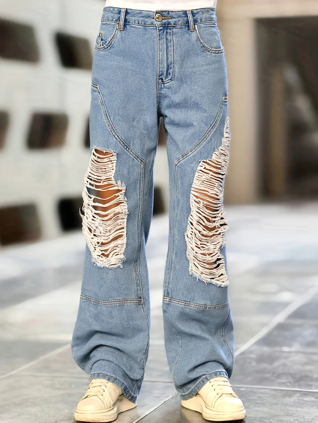 

Men's sky blue distressed wide-leg jeans, featuring a unique tear design and loose fit, effortlessly creating a trendy street st