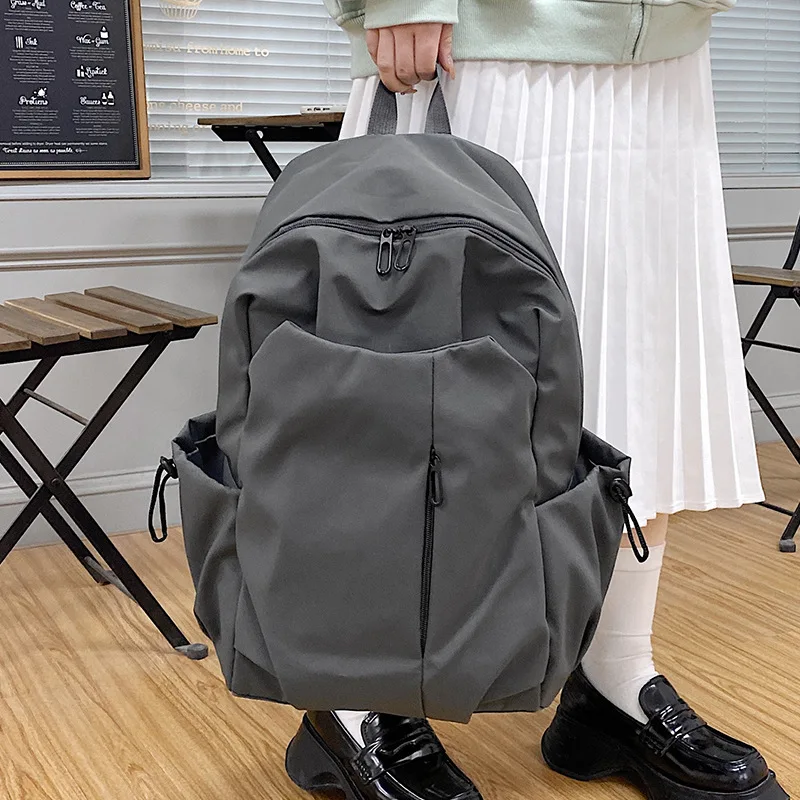 New High Capacity Student Backpack Minimalist Trend Book Bag Korean Edition Solid Color Leisure Travel Backpack for Men and Wome