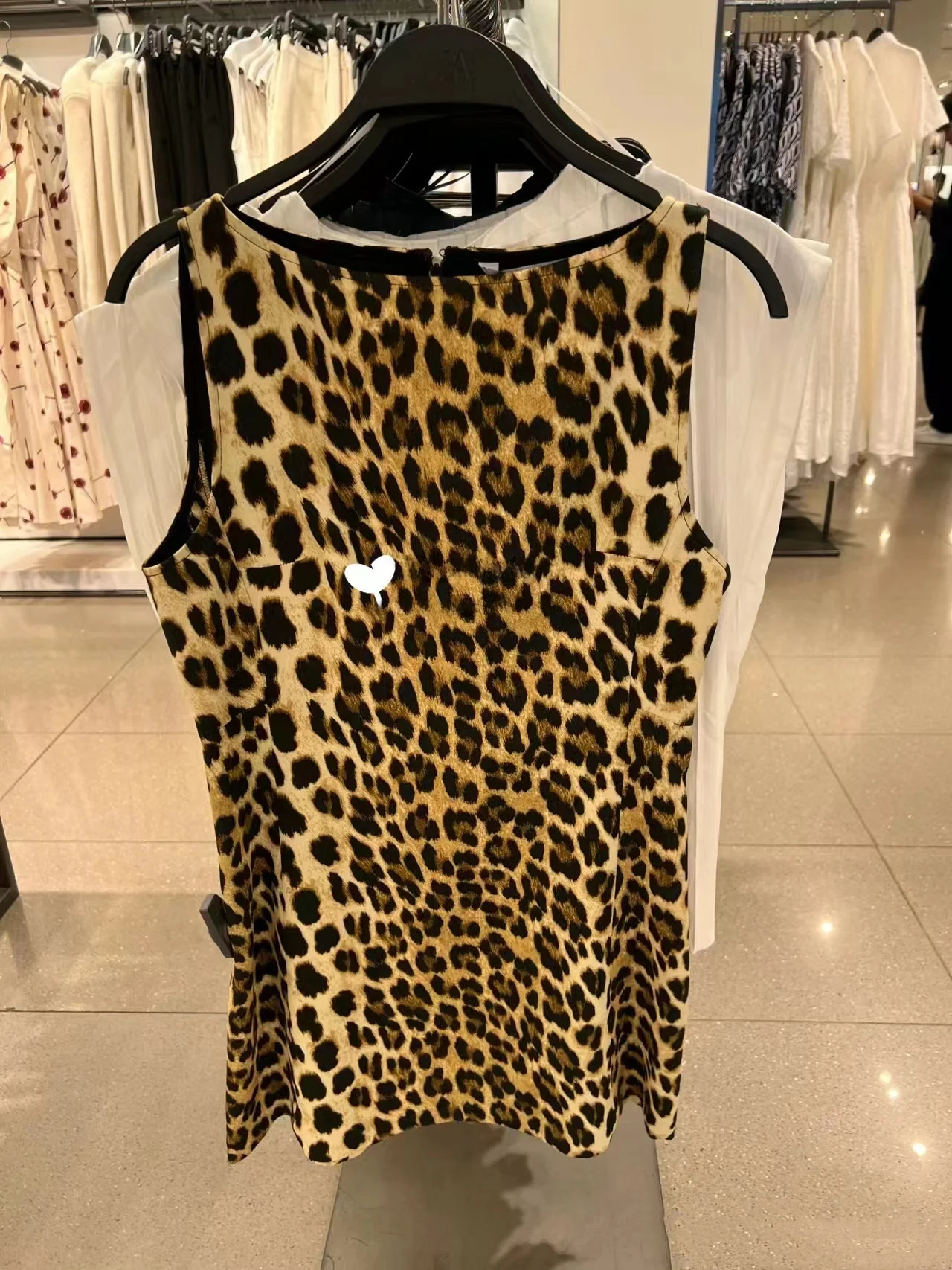 تنورة صيف 2025 مثيرة بتصميم عتيق مطبوع عليها حيوانات الفهد Dr للسيدات تنورة على شكل حرف a من ألياف البوليستر بقصة ضيقة مستديرة من Neline