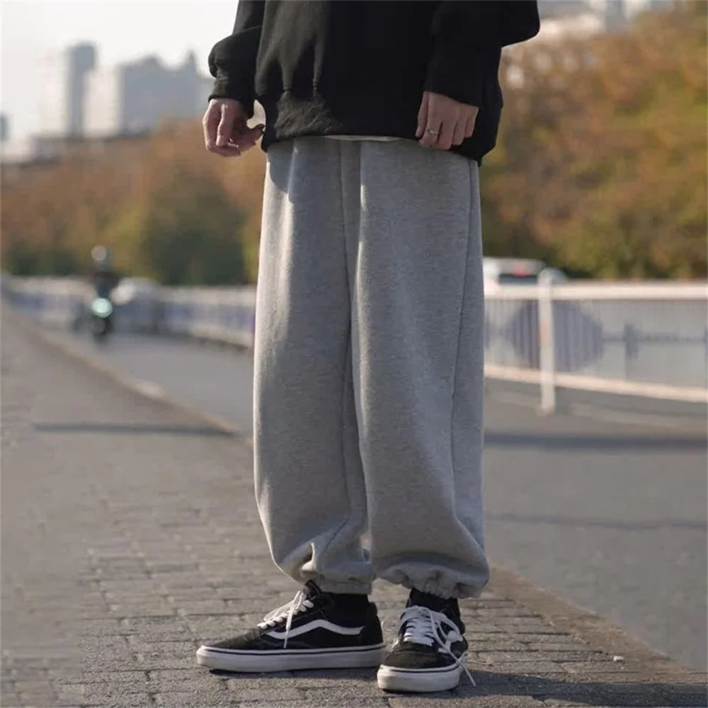 Casual Gray Sweatpants Loose Fit Joggers Mid Seam Design Elastic Cuff Streetwear Fleece Lined Sport Pants for Daily Wear Workout