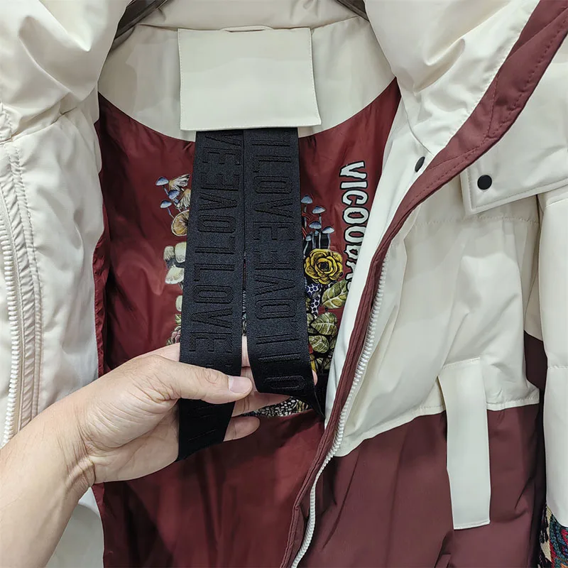 Abrigo acolchado de algodón para mujer, Chaqueta corta de moda con diseño de sensibilidad y empalme, novedad de invierno, 2024