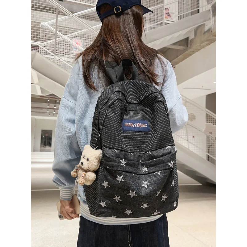 Korean-style denim backpack with color-blocking stripes and stars, suitable for female college students, versatile for commuting