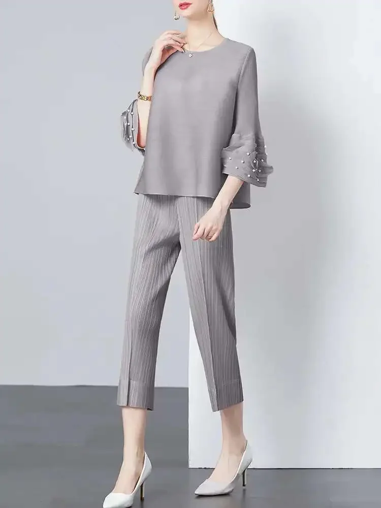 

2025 Summer New Miyake Fashion Pleated Two-piece Set Three-dimensional Flowers Loose Top + Trousers Solid Colour Leisure