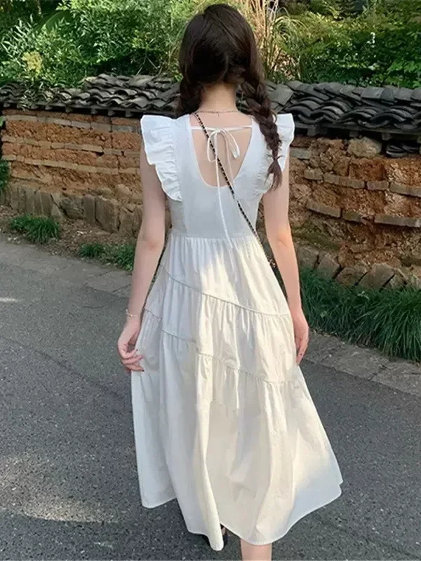 Verão novo pequeno vestido de mangas voadoras feminino design doce fino fada estilo francês vestido longo sólido adorável em camadas moda
