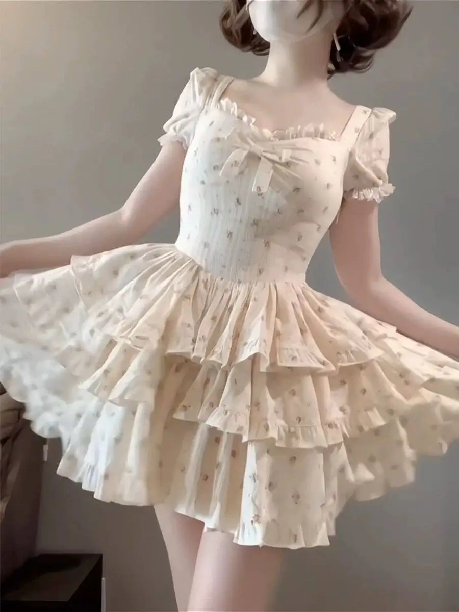 

Cute Floral Tiered Dress Perfect For Dates Parties And Photoshoots With Cinched Waist And Puff Sleeves