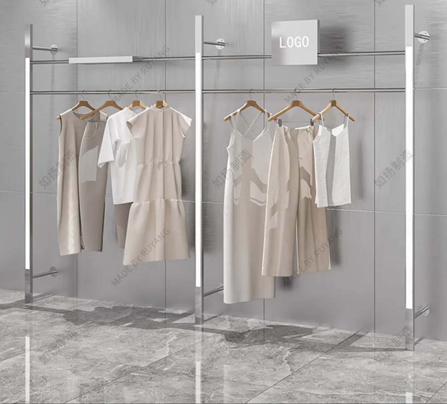 Stainless steel clothing store display shelves with wall mounted lights and wall mounted dedicated display shelves